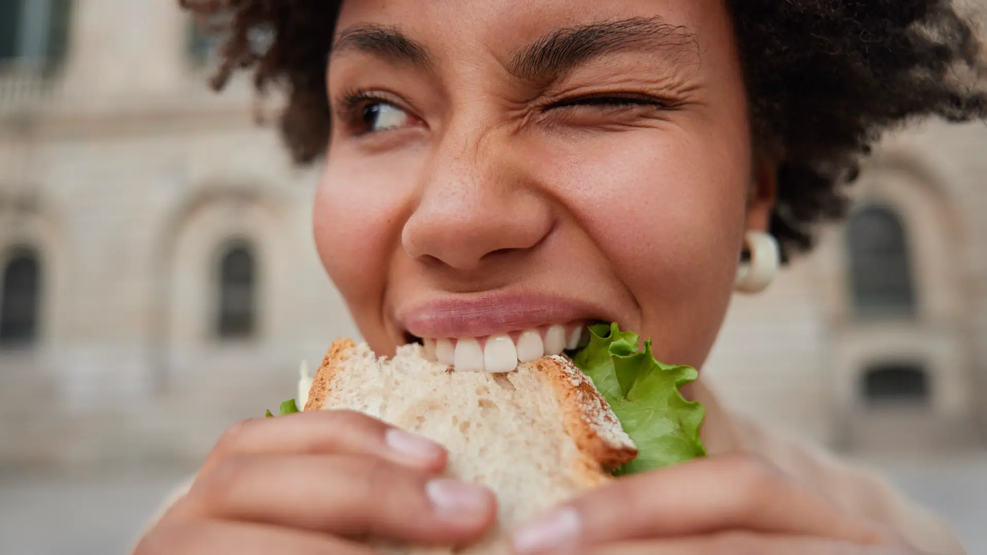 Hovis News -The BLT Woman-eating-Bacon-Lettuce-Tomato-Sandwich