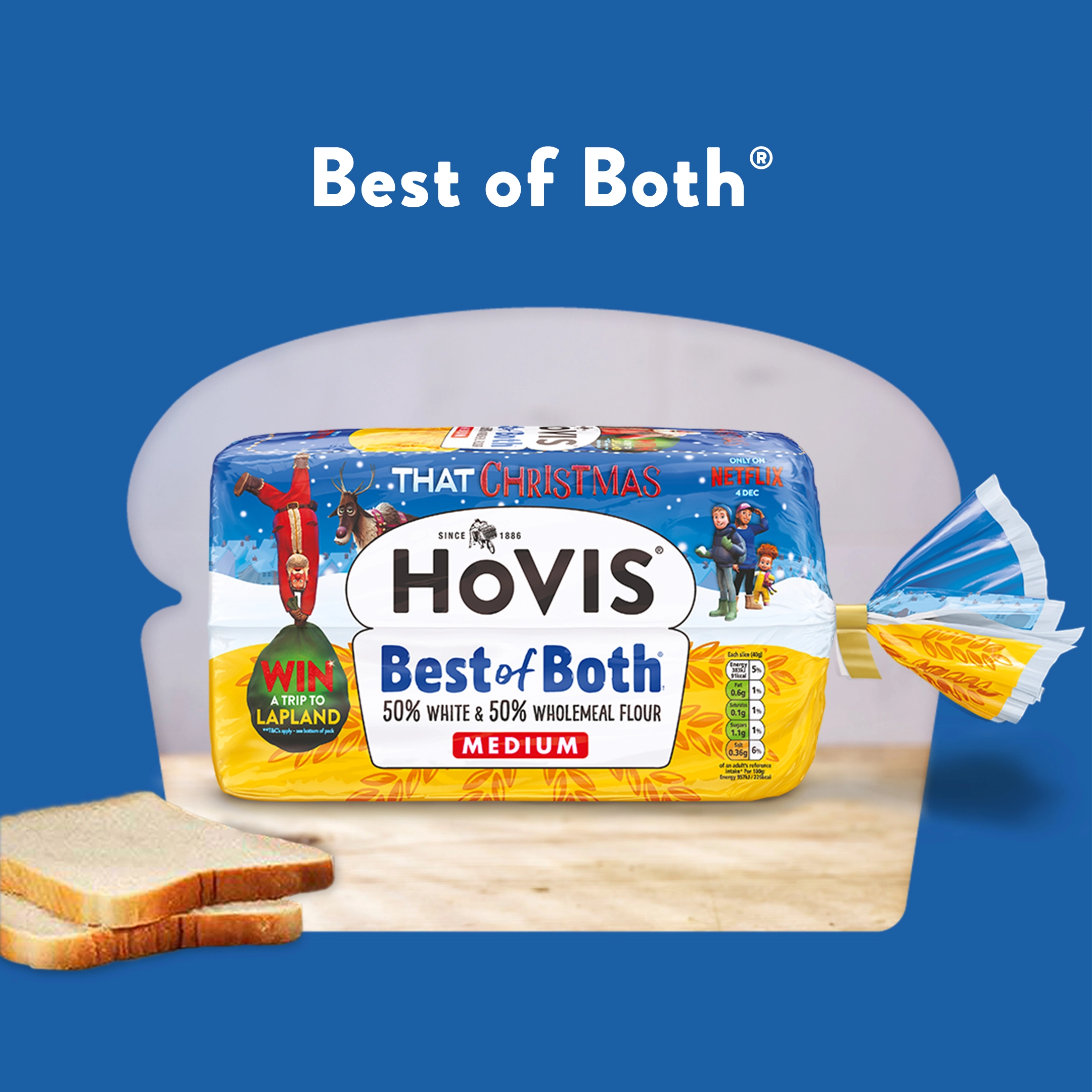 The text reads: Best of Both. A Hovis Best of Both loaf sits on a wooden table with a few slices of bread to the side. Its cropped into a loaf shape with a blue background. 